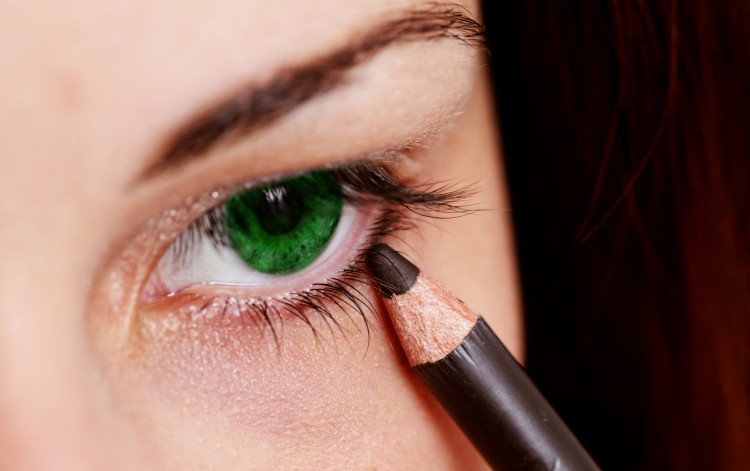 Young Woman Using Eyeliner